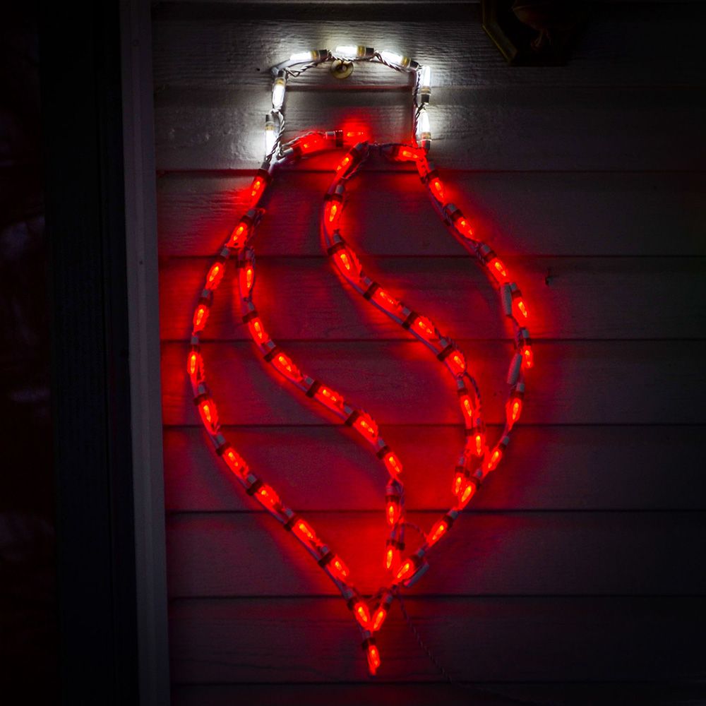 Red Twist Drop Ornament LED Display installed on exterior house siding showing full ornament shape at night