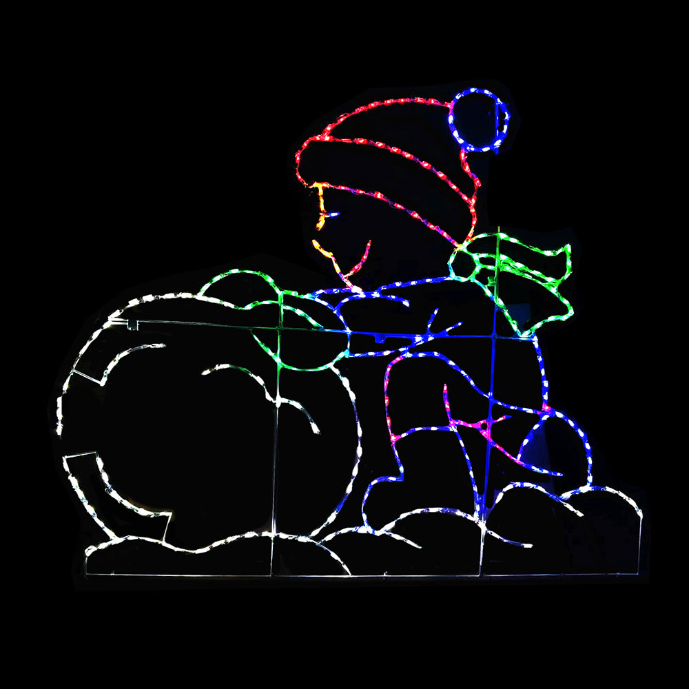 A holiday light display featuring a colorful silhouette of a child wearing a hat and scarf, rolling a snowball