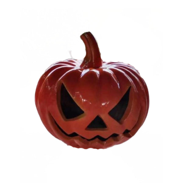 Deep orange fiberglass jack-o-lantern display with carved menacing face, glossy finish, and dark hollow eyes — Halloween outdoor decoration/statue