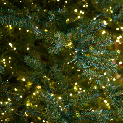 13' Alpine Tree with Warm White LED bulbs - needles and white lights close-up 1