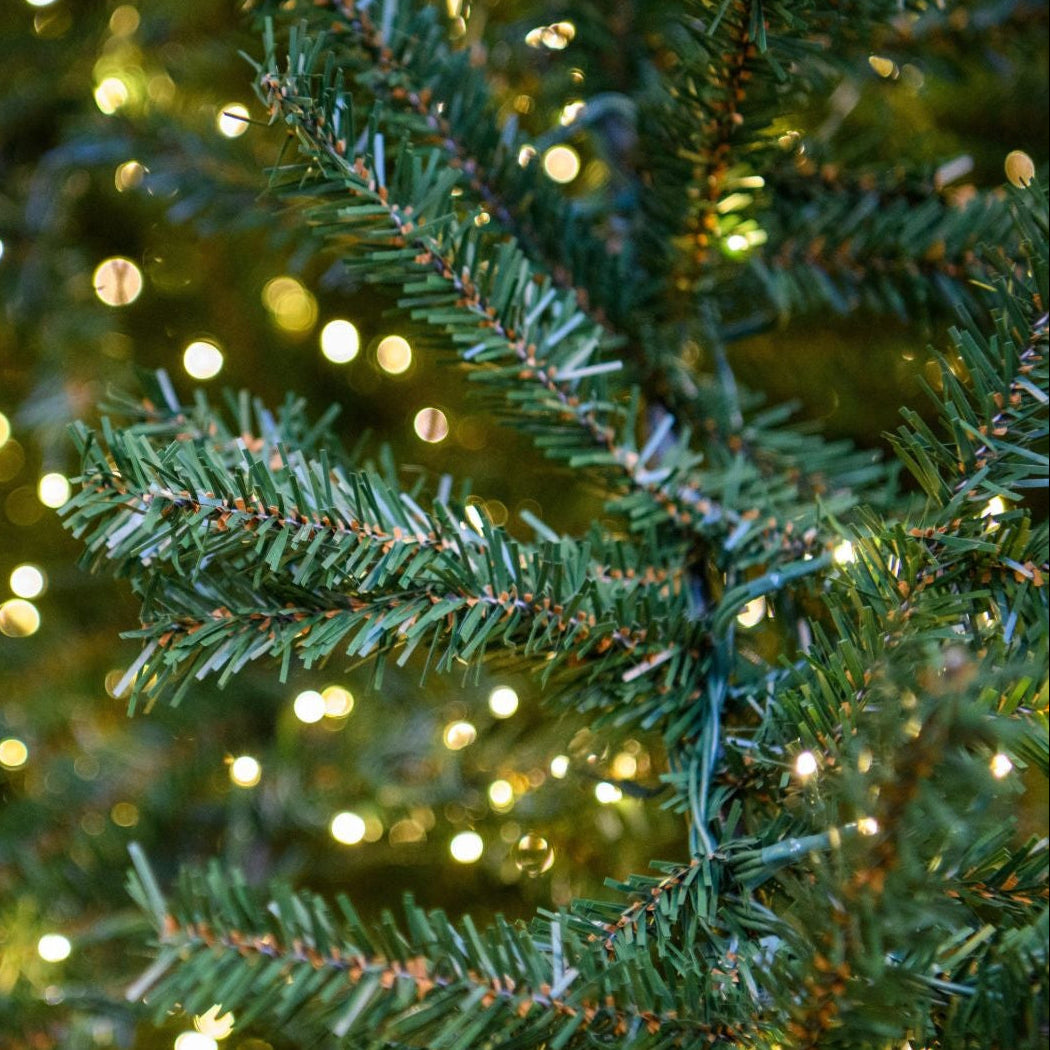 13' Alpine Tree with Warm White LED bulbs - needles and white lights close-up 2