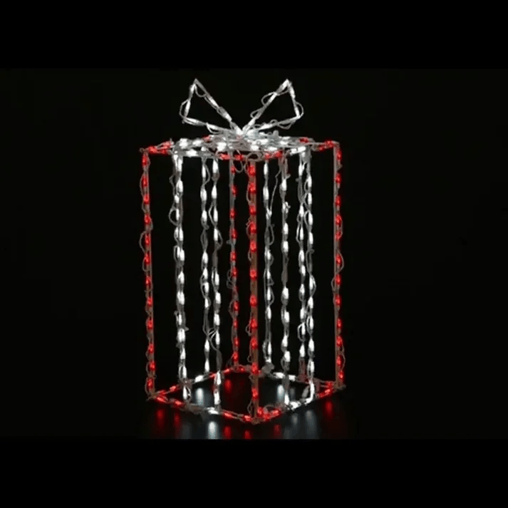 Tall 3D Gift Box LED Display in red and white with glowing white bow on top, wireframe LED construction against black background