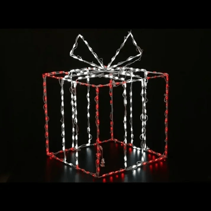 Large 3D Gift Box LED Display in red and white with white LED bow accent, wireframe cube construction against black background