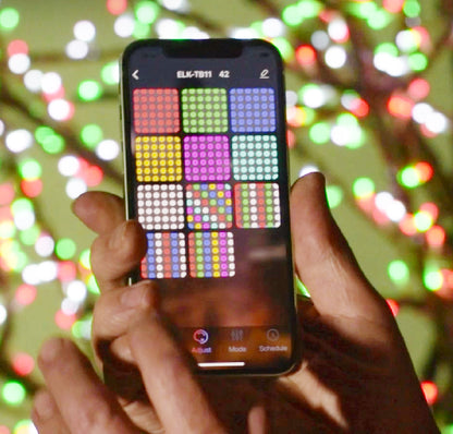 Smartphone controlling RGB lighting display via Bluetooth App Controller 